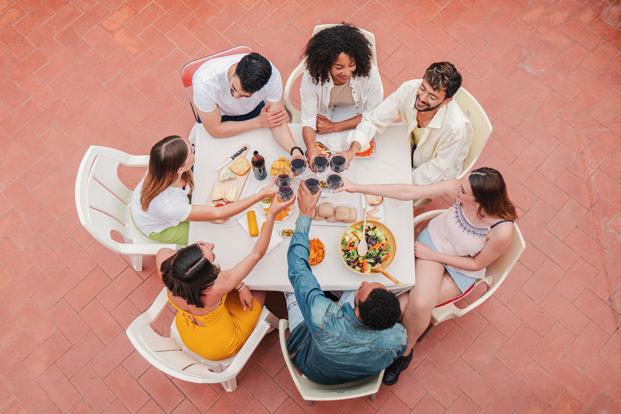 Group tasting around a wooden table